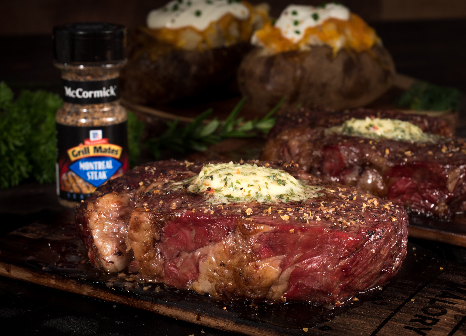 Hickory Planked Ribeye Steaks with Cowboy Butter